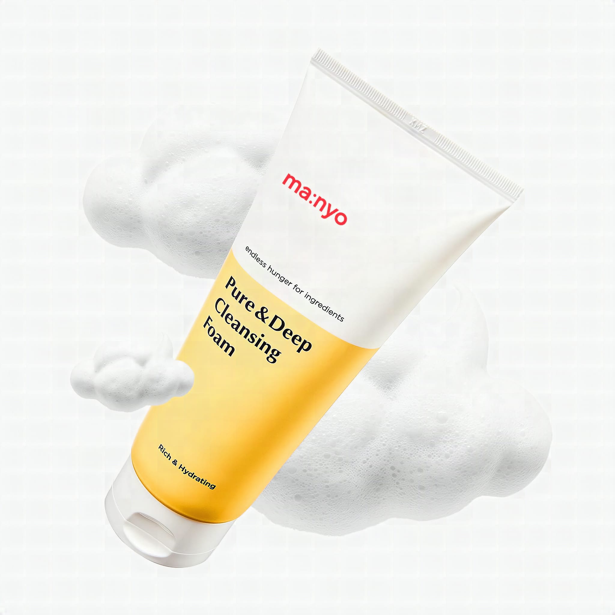 MANYO Pure & Deep Cleansing Foam, Blackhead & Pore Face Wash, 6.7 fl oz: Woman in a bright bathroom rubbing dense white