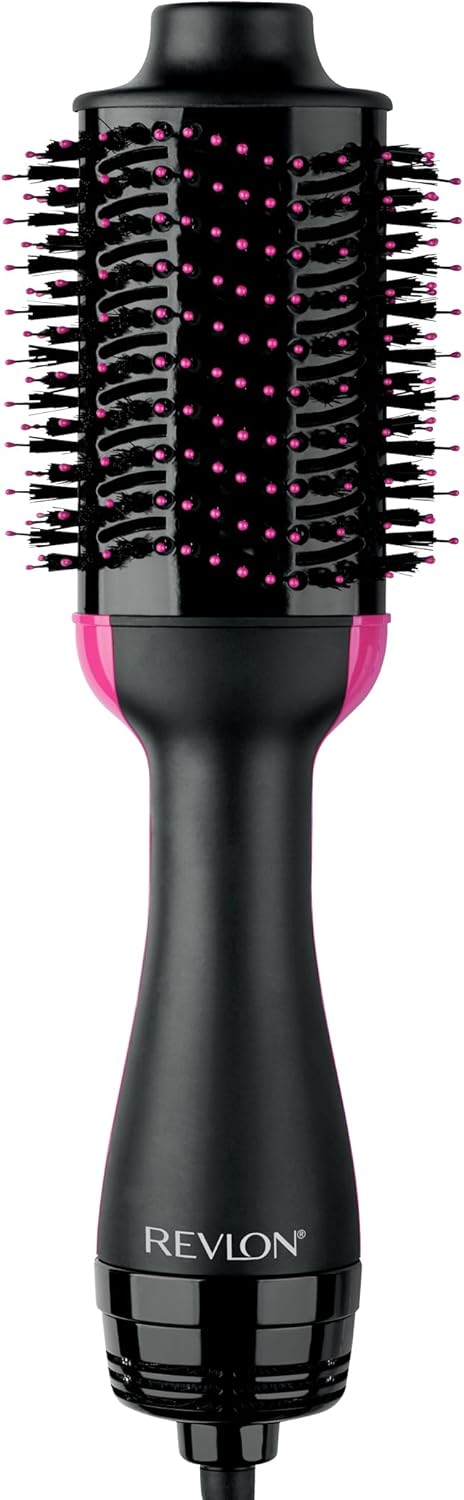 REVLON One-Step Volumizer Hair Dryer and Styler, 2.8 in Barrel, Black: A woman using a pink and black Revlon One-Step Vo