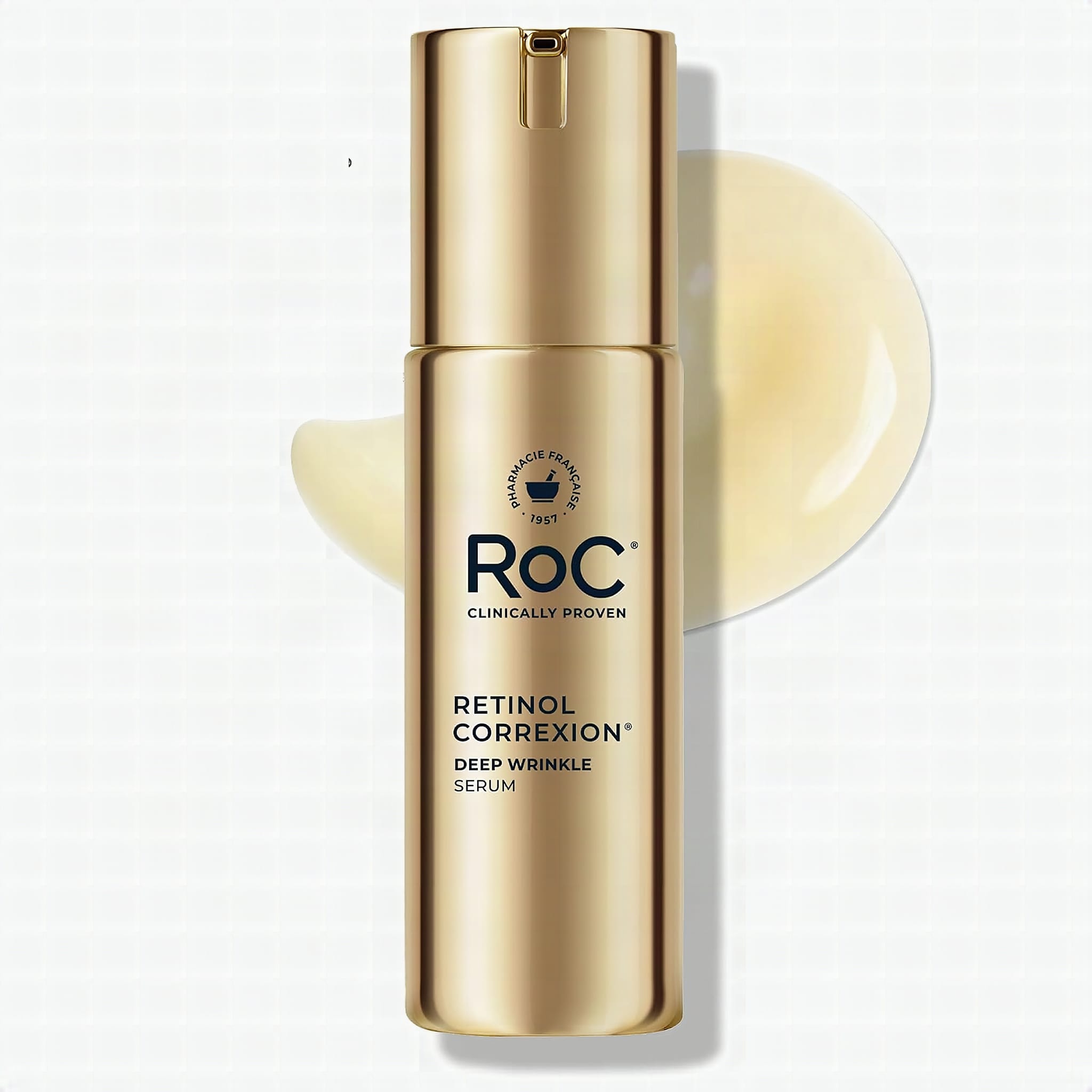 RoC Retinol Correxion Deep Wrinkle Retinol Face Serum, Ascorbic Acid, 1 0z: Woman in her 50s applying a drop of clear re